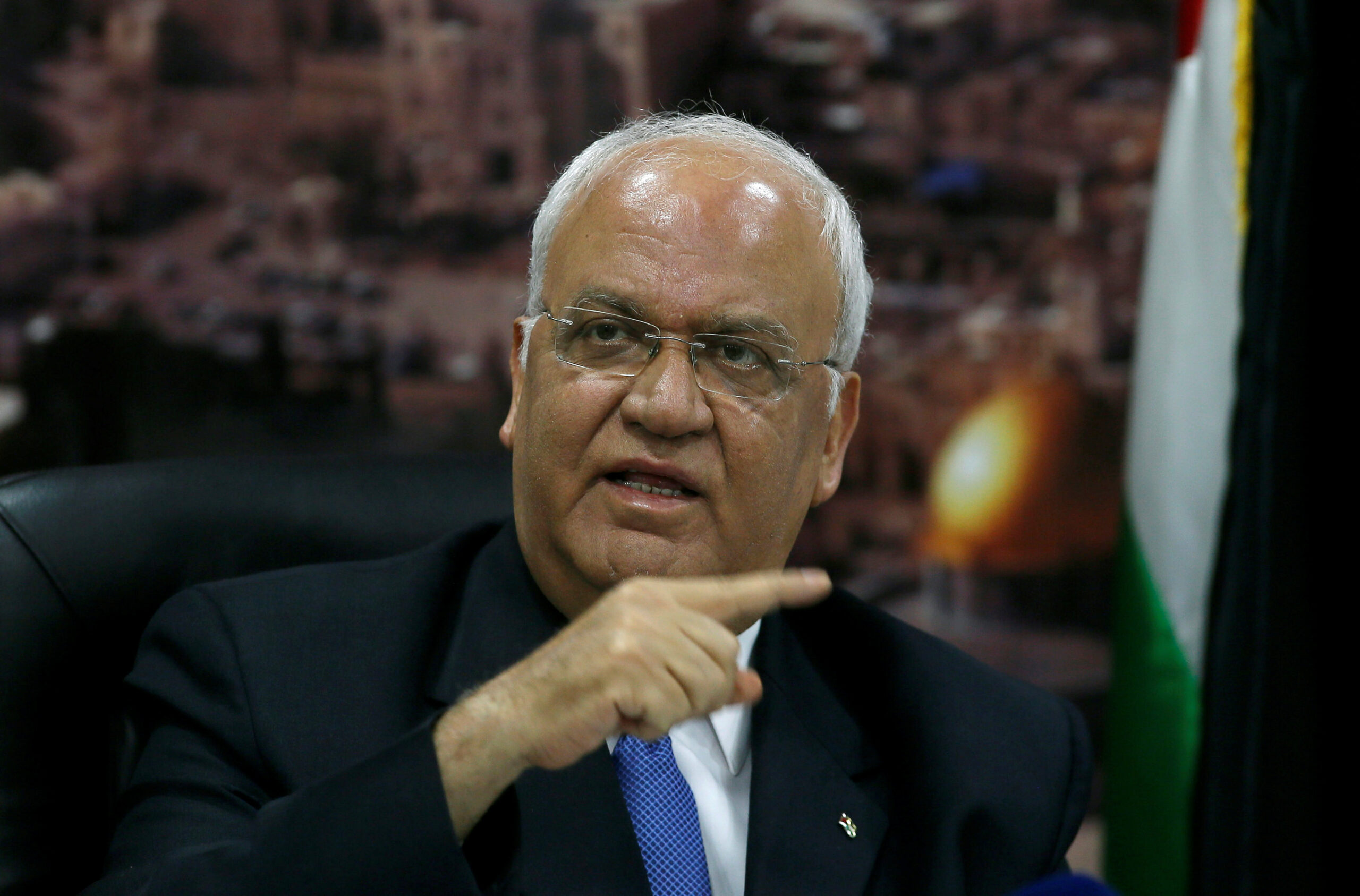 Chief Palestinian negotiator Saeb Erekat gestures during a news conference in Ramallah in the occupied West Bank June 24, 2018. REUTERS/Mohamad Torokman