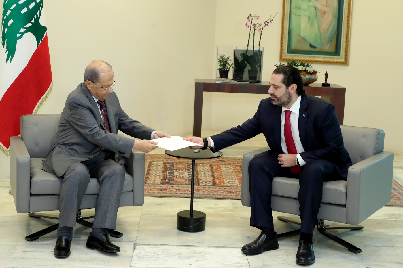 Lebanon's Prime Minister Saad al-Hariri hands over his resignation letter to Lebanon's President Michel Aoun at the Baabda Palace, in Baabda Lebanon October 29, 2019. Dalati Nohra/Handout via REUTERS ATTENTION EDITORS - THIS IMAGE WAS PROVIDED BY A THIRD PARTY NO RESALES. NO ARCHIVES TPX IMAGES OF THE DAY