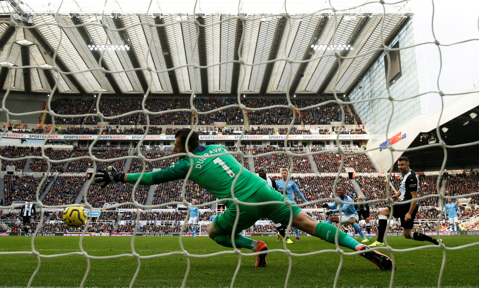 Soccer Football - Premier League - Newcastle United v Manchester City - St James' Park, Newcastle, Britain - November 30, 2019 Manchester City's Raheem Sterling scores their first goal Action Images via Reuters/Lee Smith EDITORIAL USE ONLY. No use with unauthorized audio, video, data, fixture lists, club/league logos or "live" services. Online in-match use limited to 75 images, no video emulation. No use in betting, games or single club/league/player publications. Please contact your account representative for further details.