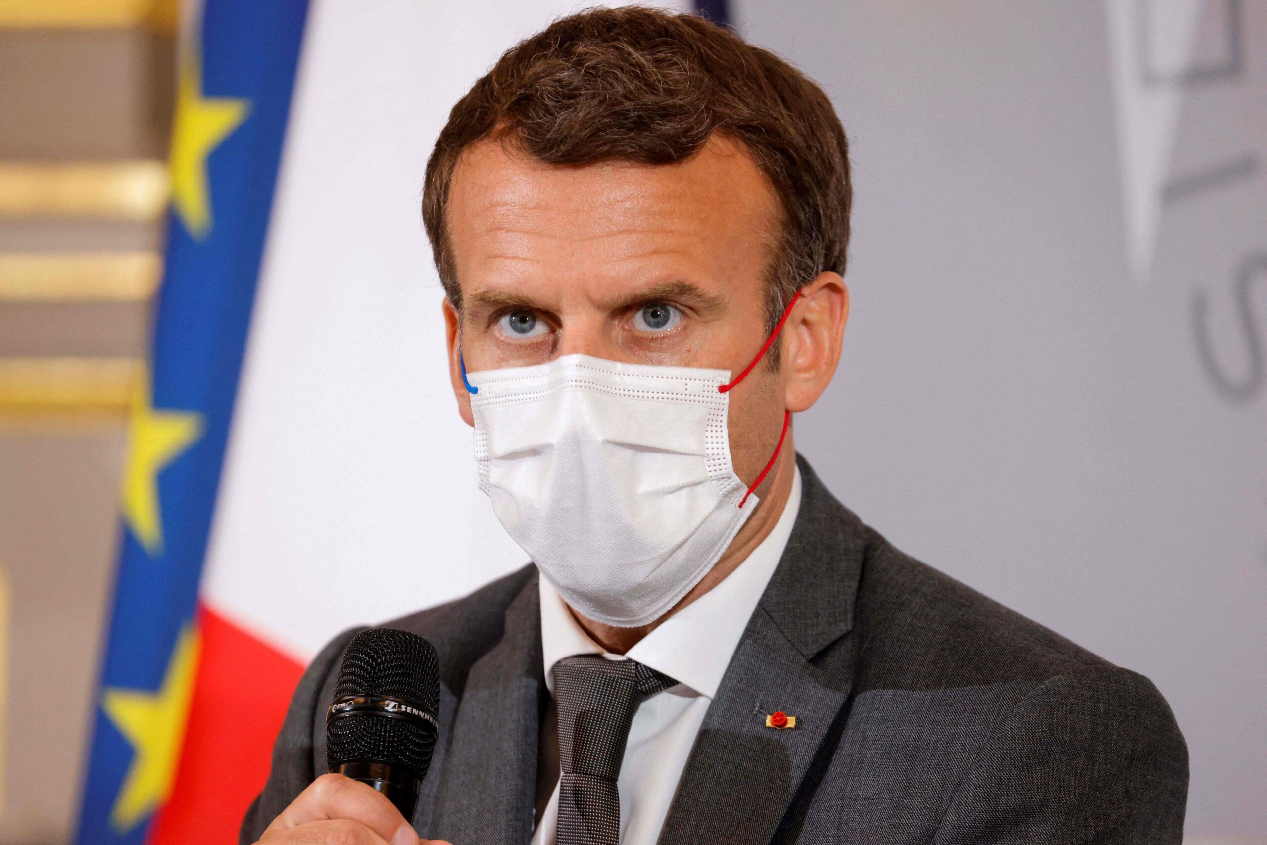 French President Emmanuel Macron (C) attends a meeting with NGO representatives ahead of the G7 Summit, at the Elysee Palace in Paris, on June 9, 2021. / AFP / POOL / PASCAL ROSSIGNOL