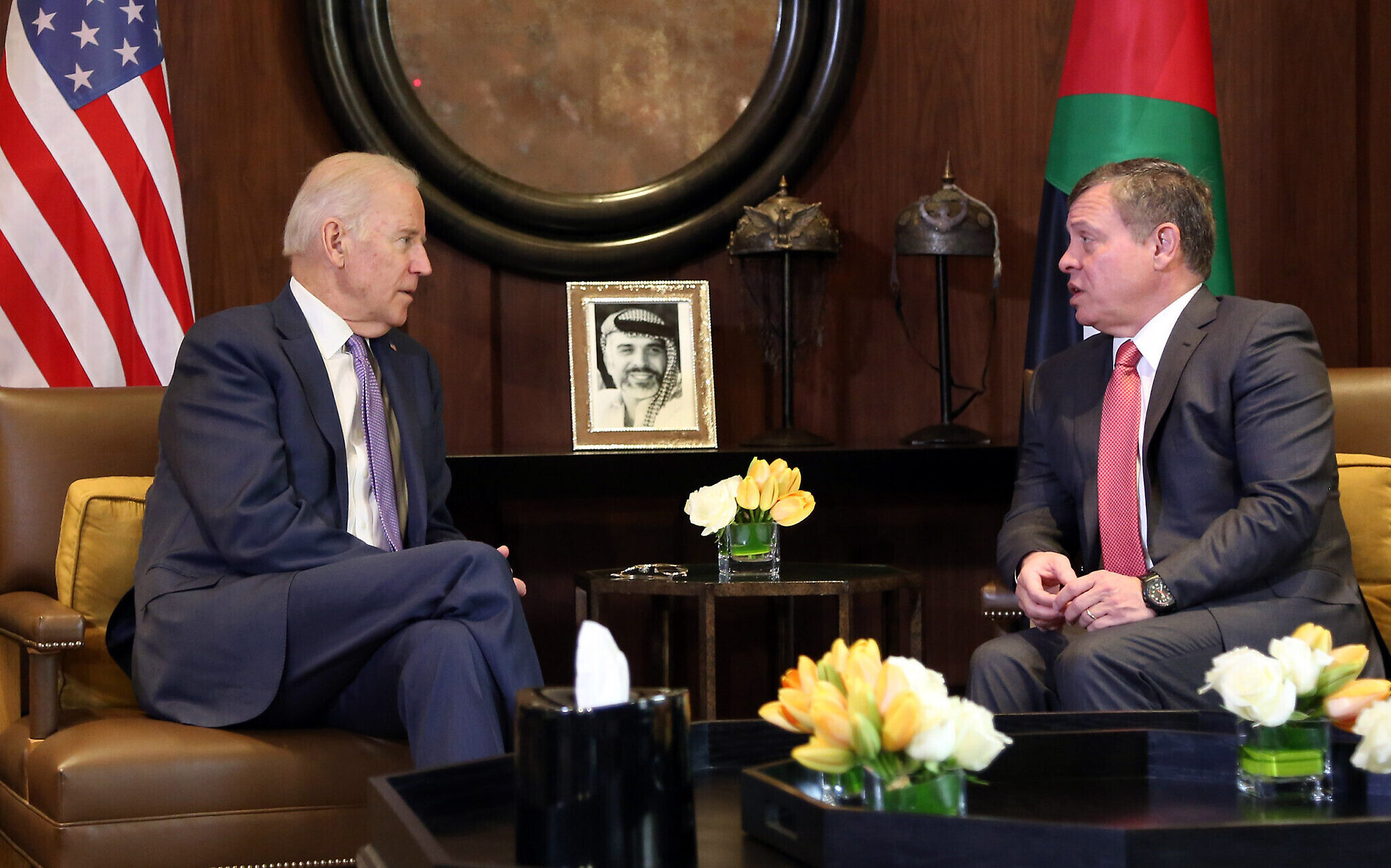 King Abdullah II of Jordan, right, meets with US Vice President Joe Biden, at the Husseiniya Palace in Amman, Jordan, Thursday, March 10, 2016. (AP Photo/Raad Adayleh)