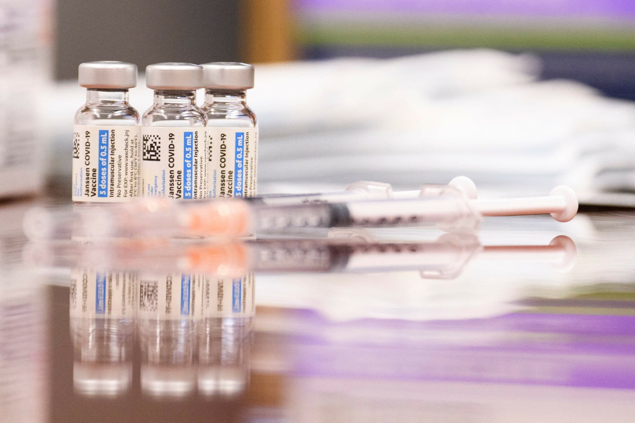 (FILES) In this file photo vials and syringes of the Johnson and Johnson Janssen Covid-19 vaccine are displayed at a Culver City Fire Department vaccination clinic on August 5, 2021, in California. Johnson & Johnson said on August 25, 2021 a second dose of its Covid-19 vaccine boosted immunity beyond the first dose. In two clinical studies that have not yet been peer-reviewed, the additional shot evoked a nine-fold increase in antibodies to the coronavirus, the company said in a news release. President Joe Biden's administration has announced plans for all Americans vaccinated with mRNA vaccines -- Pfizer and Moderna -- to receive a third dose eight months after the second in the series. The Centers for Disease Control and Prevention (CDC) has said it expects a second dose of the J&J vaccine will be required, but that it needs more data before making a firm recommendation. (Photo by Patrick T. FALLON / AFP)