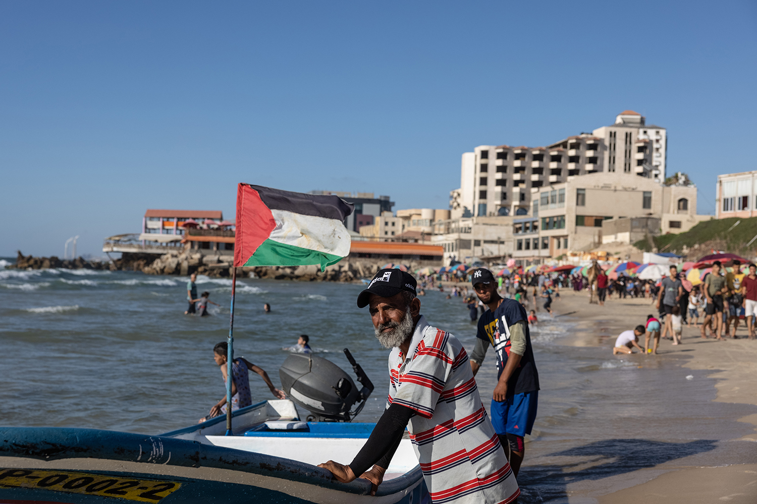 People on Gaza Beach on June 17. Since the 2007-imposed blockade, Gazans have almost no chance of leaving the small enclave. Stefanie Glinski for Foreign Policy