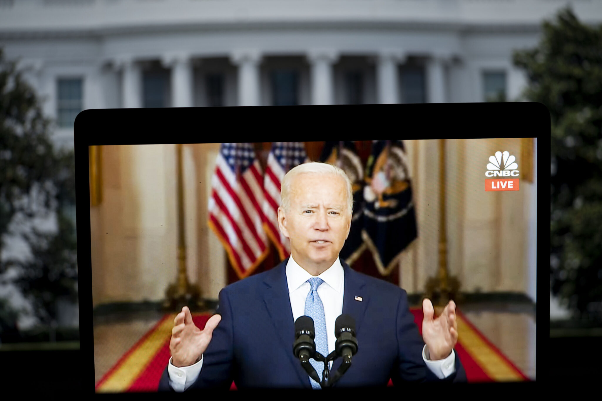 (210901) -- WASHINGTON D.C., Sept. 1, 2021 (Xinhua) -- U.S. President Joe Biden is seen on screen as he delivers remarks at the White House in Washington D.C. Aug. 31, 2021. Joe Biden on Tuesday defended his decision to hastily pull U.S. troops out of Afghanistan, a mission broadly criticized by the American public. (Xinhua/Liu Jie)