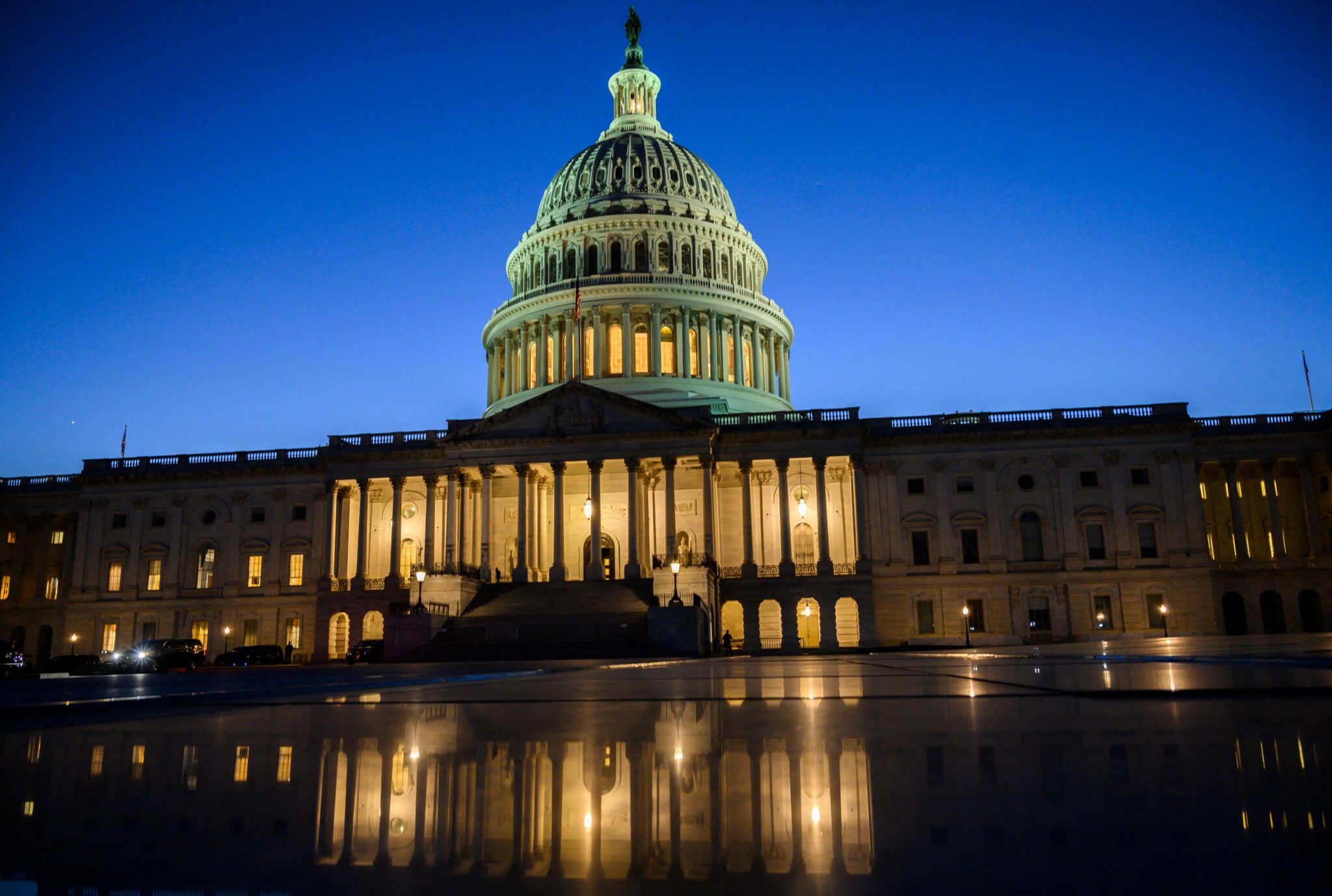 (FILES) In this file photo taken on October 01, 2021 the US Capitol is seen at dusk in Washington, DC. The US Senate voted October 7, 2021 to stave off a credit default that would have sparked a recession and roiled world markets as Democrats and Republicans agreed to a stop-gap fix to raise the nation's debt limit. (Photo by Andrew CABALLERO-REYNOLDS / AFP)