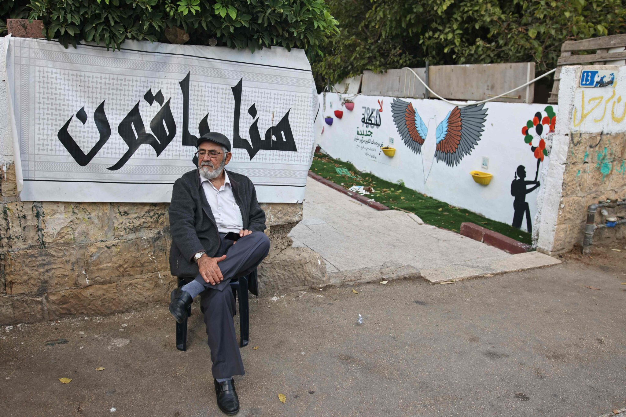 Palestinian resident Nabil al-Kurd is pictured following a press conference in the flashpoint Jerusalem neighbourhood of Sheikh Jarrah on November 2, 2021. (Photo by AHMAD GHARABLI / AFP)