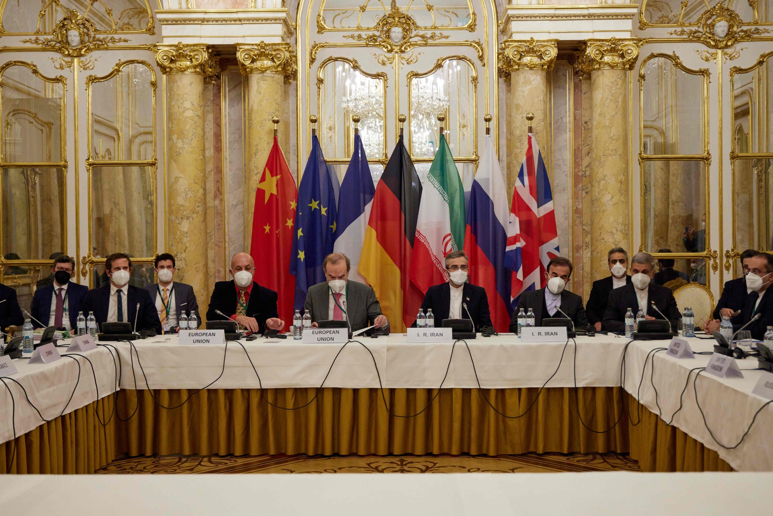 This handout photo taken and released on December 27, 2021 by the EU delegation in Vienna - EEAS shows representatives attending a meeting of the joint commission on negotiations aimed at reviving the Iran nuclear deal in Vienna, Austria. RESTRICTED TO EDITORIAL USE - MANDATORY CREDIT "AFP PHOTO / EU DELEGATION IN VIENNA / EEAS" - NO MARKETING - NO ADVERTISING CAMPAIGNS - DISTRIBUTED AS A SERVICE TO CLIENTS (Photo by Handout / various sources / AFP) / RESTRICTED TO EDITORIAL USE - MANDATORY CREDIT "AFP PHOTO / EU DELEGATION IN VIENNA / EEAS" - NO MARKETING - NO ADVERTISING CAMPAIGNS - DISTRIBUTED AS A SERVICE TO CLIENTS