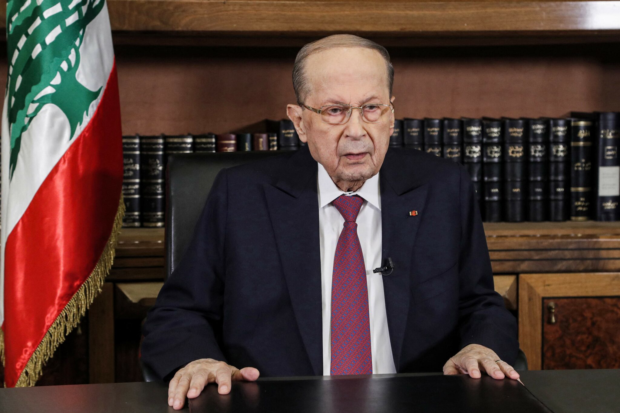 A handout picture provided by the Lebanese photo agency Dalati and Nohra on December 27, 2021 shows President Michel Aoun giving a speech at the presidential palace in Baabda, east of Beirut. === RESTRICTED TO EDITORIAL USE - MANDATORY CREDIT "AFP PHOTO / HO / DALATI AND NOHRA" - NO MARKETING - NO ADVERTISING CAMPAIGNS - DISTRIBUTED AS A SERVICE TO CLIENTS === (Photo by DALATI AND NOHRA / AFP) / === RESTRICTED TO EDITORIAL USE - MANDATORY CREDIT "AFP PHOTO / HO / DALATI AND NOHRA" - NO MARKETING - NO ADVERTISING CAMPAIGNS - DISTRIBUTED AS A SERVICE TO CLIENTS ===