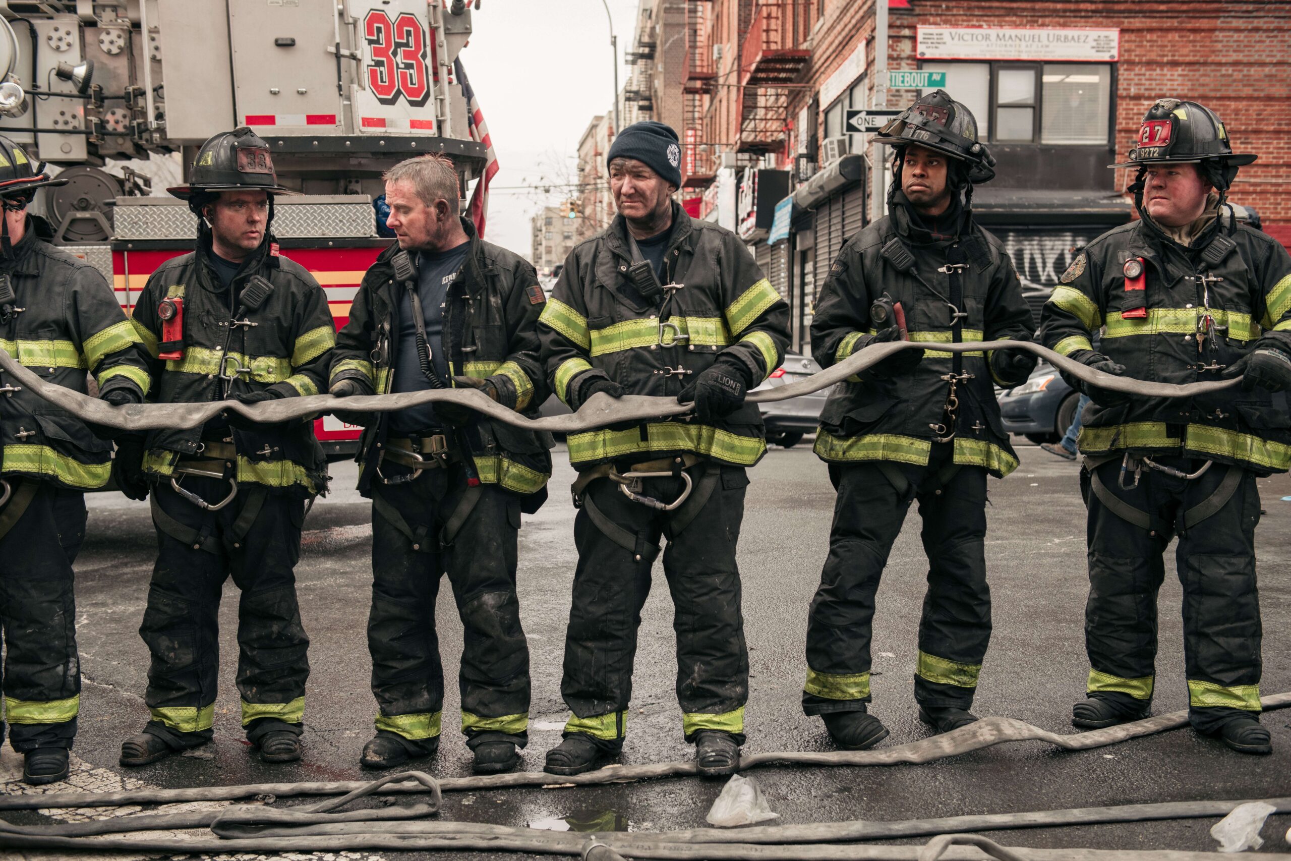 NEW YORK, NY - JANUARY 09: Emergency first responders remain at the scene after an intense fire at a 19-story residential building that erupted in the morning on January 9, 2022 in the Bronx borough of New York City. Reports indicate over 50 people were injured. Scott Heins/Getty Images/AFP == FOR NEWSPAPERS, INTERNET, TELCOS & TELEVISION USE ONLY ==