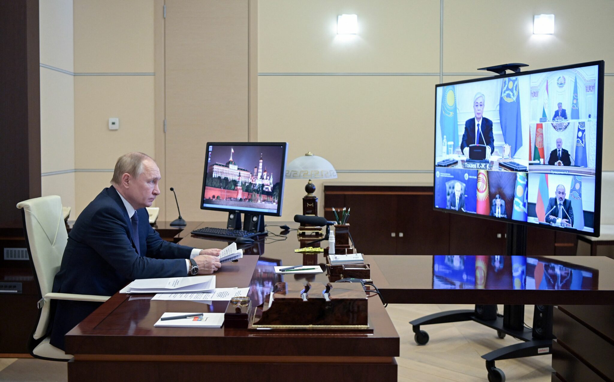 Russian President Vladimir Putin attends a video emergency meeting of the Council of the Collective Security Treaty Organization (CSTO) focused on the situation in Kazakhstan in the wake of violent protests, at the Novo-Ogaryovo state residence, outside Moscow, on January 10, 2022. (Photo by Alexey NIKOLSKY / SPUTNIK / AFP)