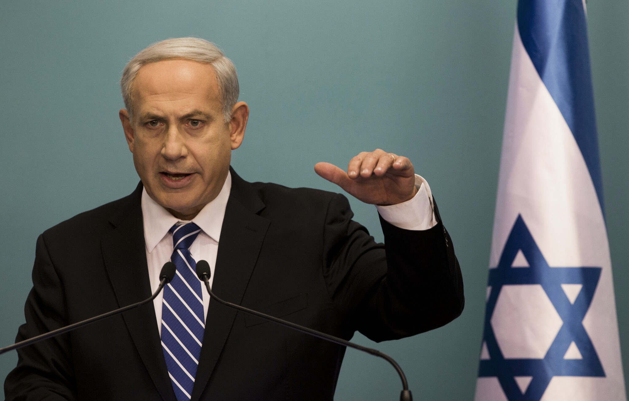 Israeli Prime Minister Benjamin Netanyahu speaks during a press conference at the Prime Minister's office in Jerusalem, Tuesday, Oct. 9, 2012. Netanyahu has ordered new parliamentary elections in early 2013, roughly eight months ahead of schedule. (AP Photo/Bernat Armangue)