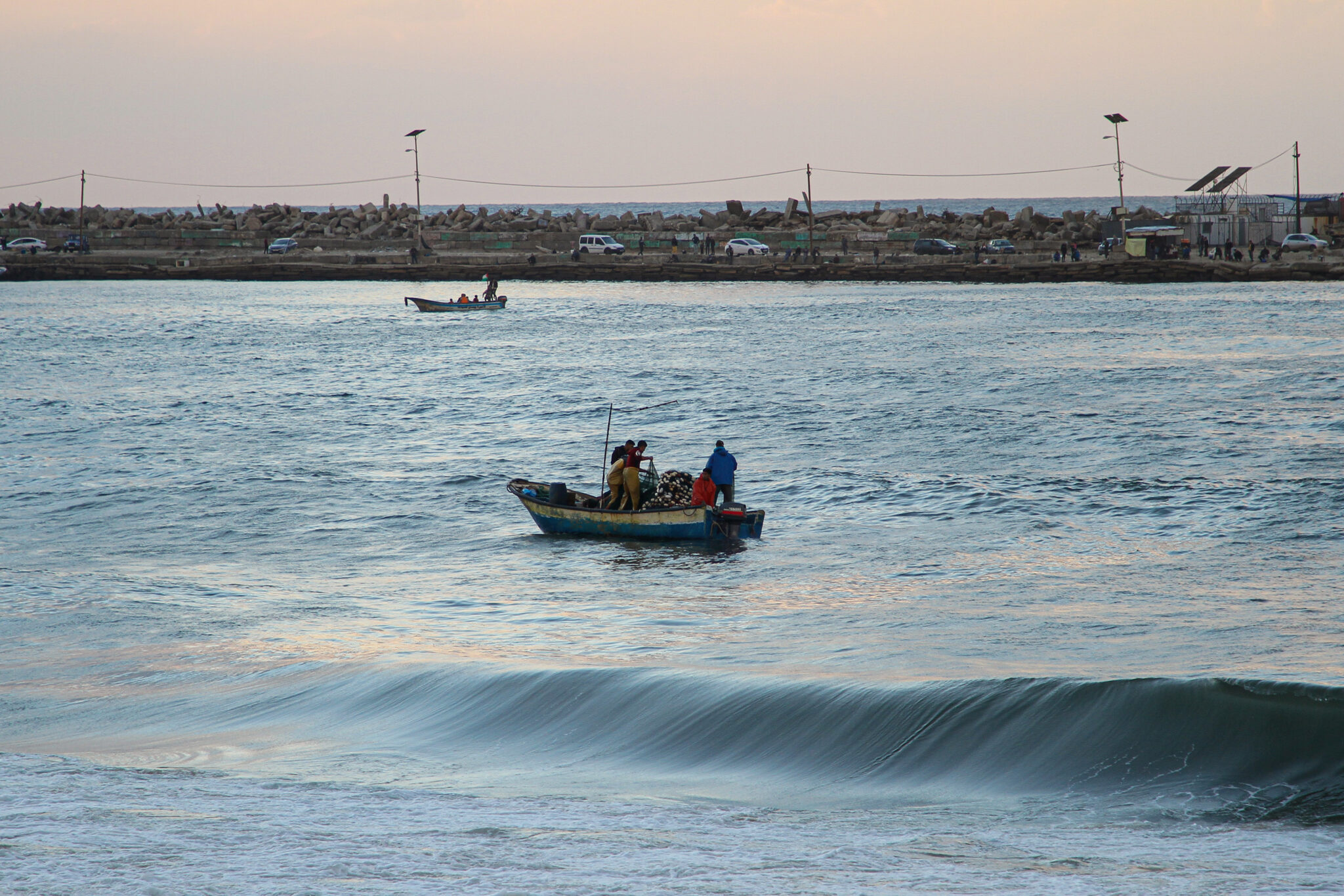 (211120) -- GAZA CITY, Nov. 20, 2021 (Xinhua) -- Fishermen go fishing off the Gaza Strip coast of the Mediterranean in Gaza City, on Nov. 19, 2021. (Photo by Rizek Abdeljawad/Xinhua)