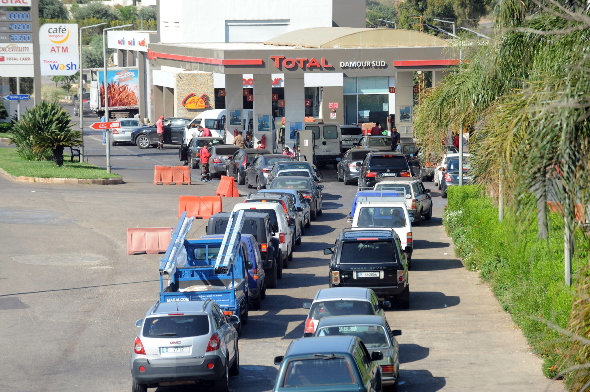 (210526) -- BEIRUT, May 26, 2021 (Xinhua) -- Cars wait in line in front of a petrol station in Beirut, Lebanon on May 26, 2021. The Lebanese rushed on Wednesday to gas stations out of fear of a rise in prices of gasoline by the end of May. (Xinhua/Bilal Jawich)