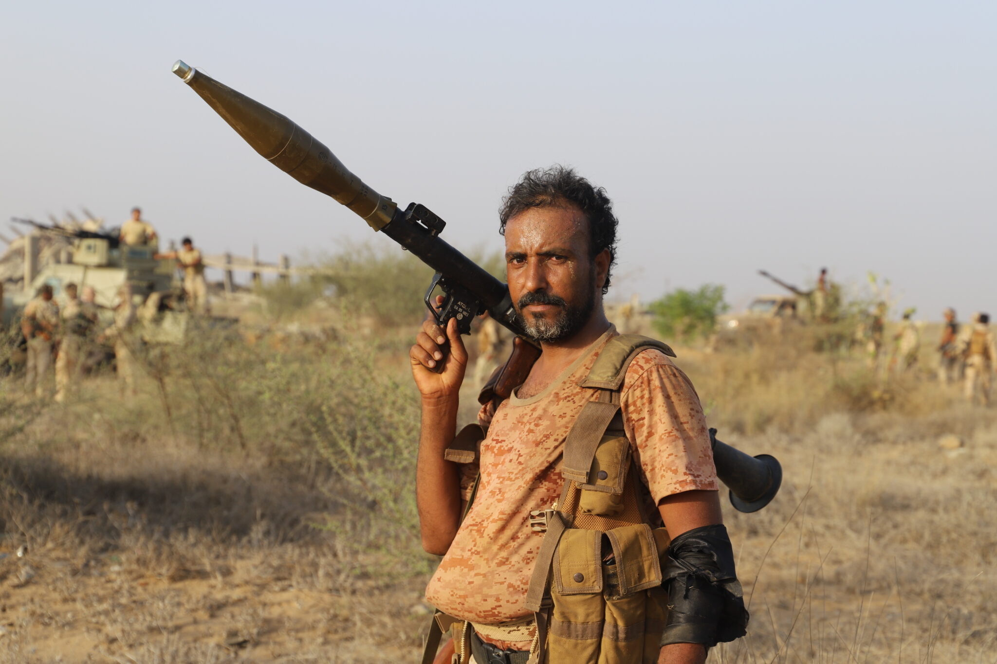 (210314) -- HAJJAH, March 14, 2021 (Xinhua) -- A soldier of the Yemeni government holds a rocket-propelled grenade (RPG) as the army launches an offensive against the Houthi rebels in Abs district, Hajjah province, Yemen on March 12, 2021. The Yemeni army backed by the Saudi-led coalition forces has begun a large-scale offensive in the frontline of Abs district, southwest of the northern Hajjah province, against the Houthi rebels. (Photo by Mohammed al-Wafi/Xinhua)