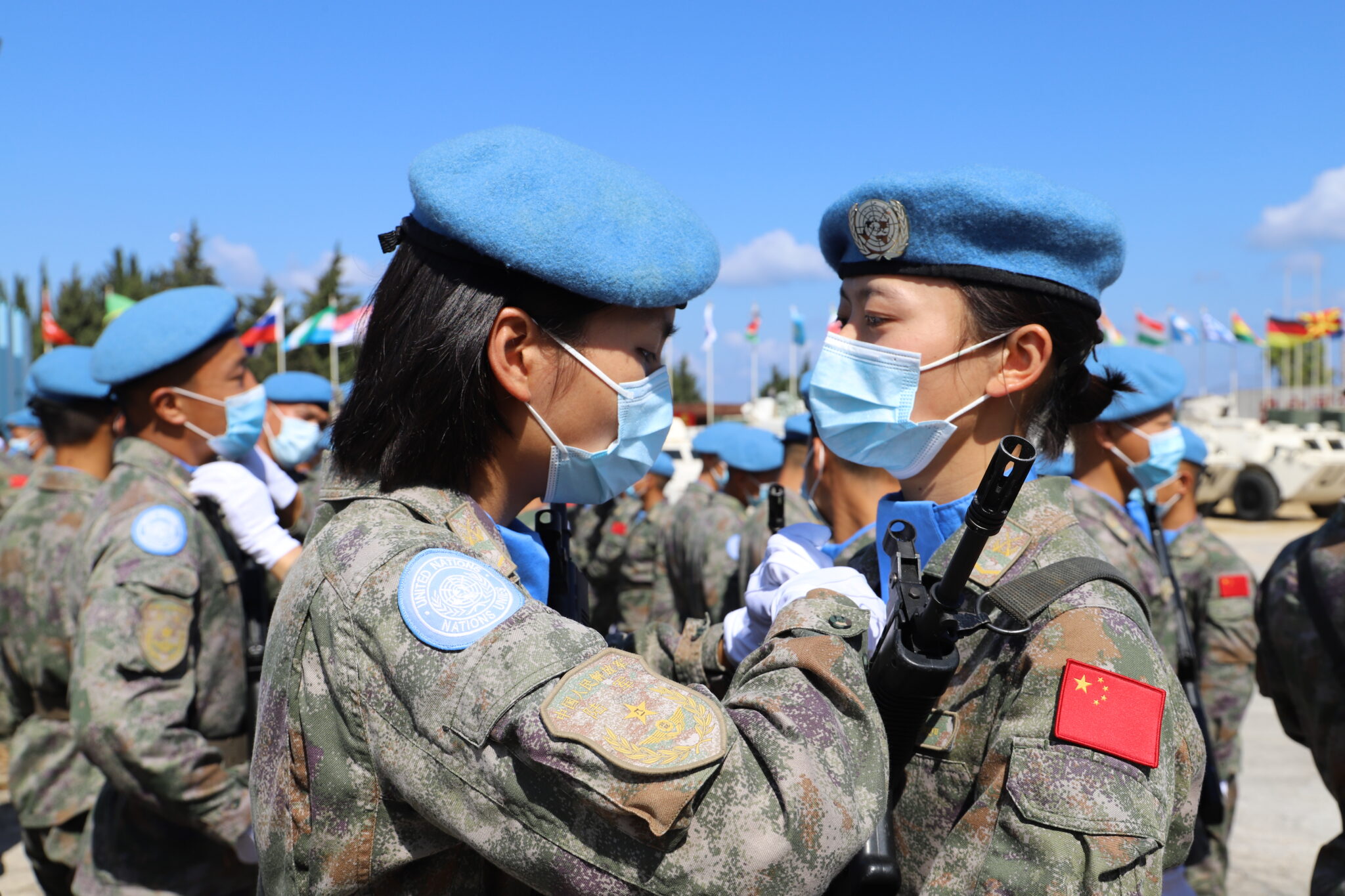 (211024) -- BEIJING, Oct. 24, 2021 (Xinhua) -- Soldiers on the Chinese contingent to the United Nations Interim Force in Lebanon (UNIFIL) are awarded the United Nations Peacekeeping Medal during a medal parade ceremony in southern Lebanon, June 16, 2021. (Photo by Liu Xiongma/Xinhua)