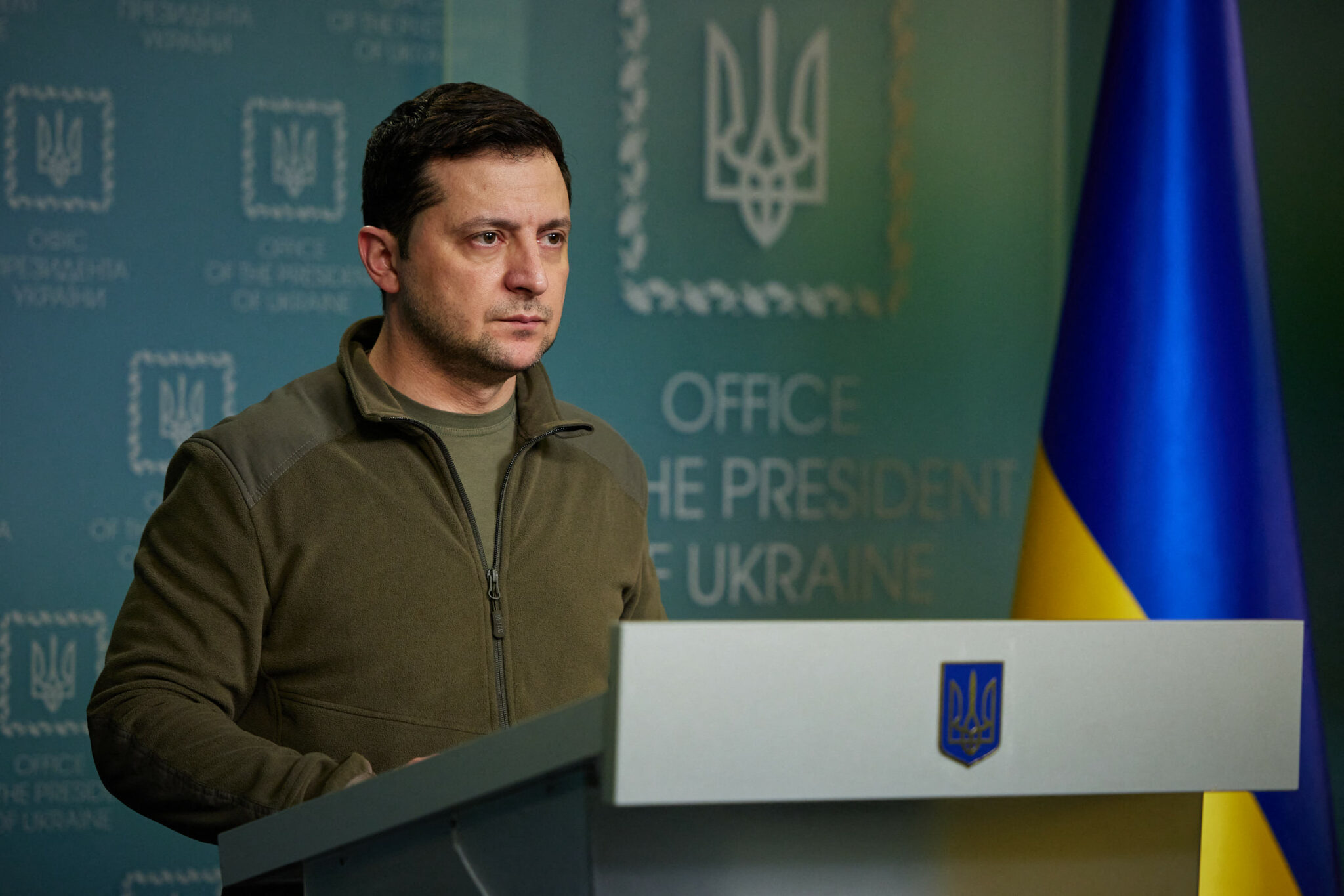 Ukrainian President Volodymyr Zelensky addresses the nation in Kyiv early on February 25, 2022. Invading Russian forces pressed deep into Ukraine as deadly battles reached the outskirts of Kyiv, with explosions heard in the capital early Friday that the besieged government described as "horrific rocket strikes". The blasts in Kyiv set off a second day of violence after Russian President Vladimir Putin defied Western warnings to unleash a full-scale ground invasion and air assault that quickly claimed dozens of lives and displaced at least 100,000 people. - RESTRICTED TO EDITORIAL USE - MANDATORY CREDIT "AFP PHOTO / Ukraine presidency / handout" - NO MARKETING - NO ADVERTISING CAMPAIGNS - DISTRIBUTED AS A SERVICE TO CLIENTS (Photo by Handout / UKRAINE PRESIDENCY / AFP) / RESTRICTED TO EDITORIAL USE - MANDATORY CREDIT "AFP PHOTO / Ukraine presidency / handout" - NO MARKETING - NO ADVERTISING CAMPAIGNS - DISTRIBUTED AS A SERVICE TO CLIENTS