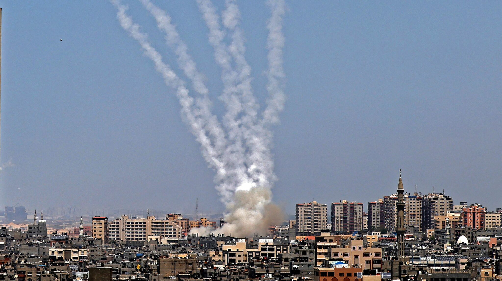 Rockets are fired from Gaza City, controlled by the Palestinian Hamas movement, towards Israel on May 11, 2021. Israel and Hamas exchanged heavy fire, in a dramatic escalation between the bitter foes sparked by unrest at Jerusalem's flashpoint Al-Aqsa Mosque compound. / AFP / MOHAMMED ABED