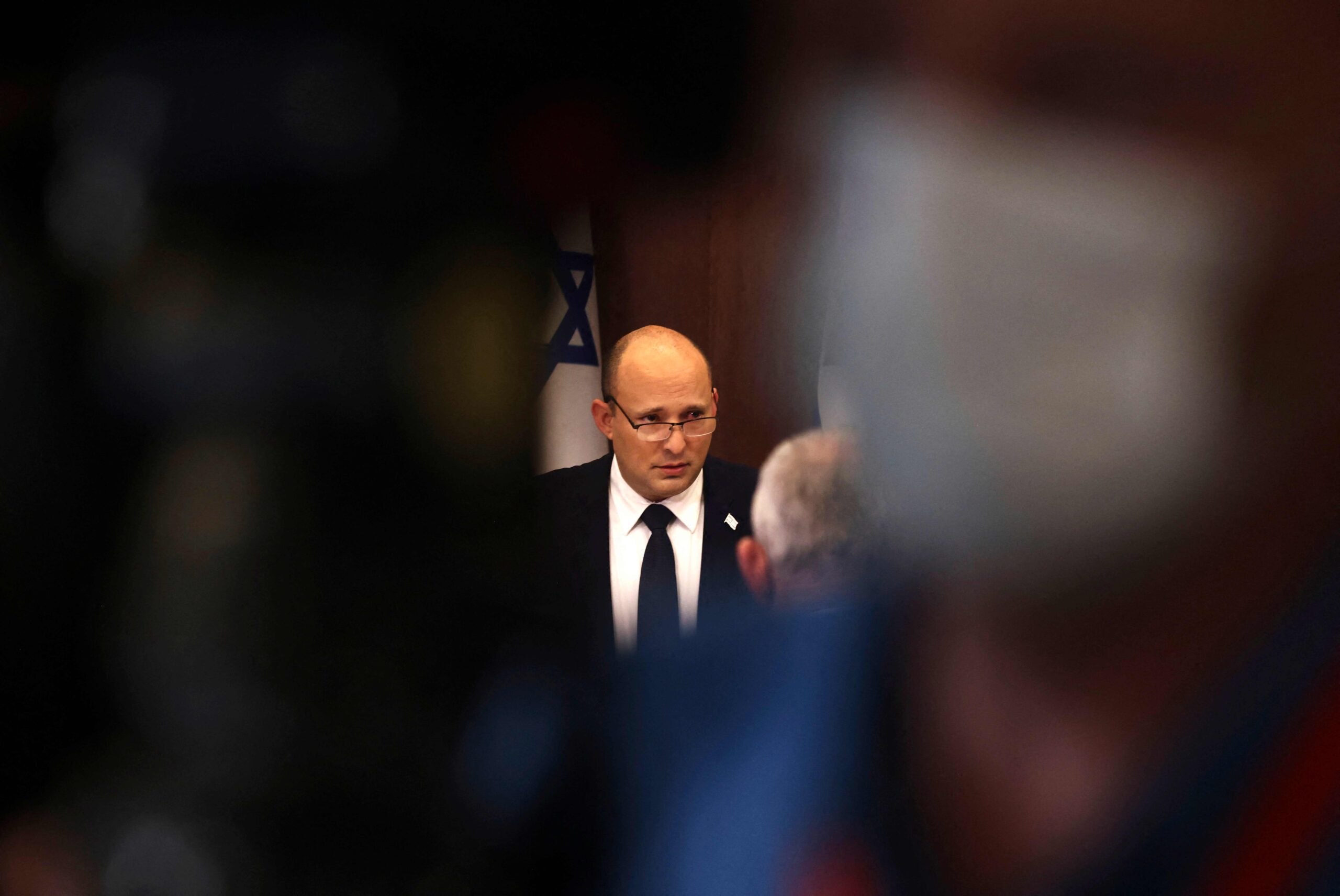 Israeli Prime Minister Naftali Bennett attends a cabinet meeting at the Prime Minister's office in Jerusalem on November 3, 2021. (Photo by RONEN ZVULUN / X90084 / AFP)