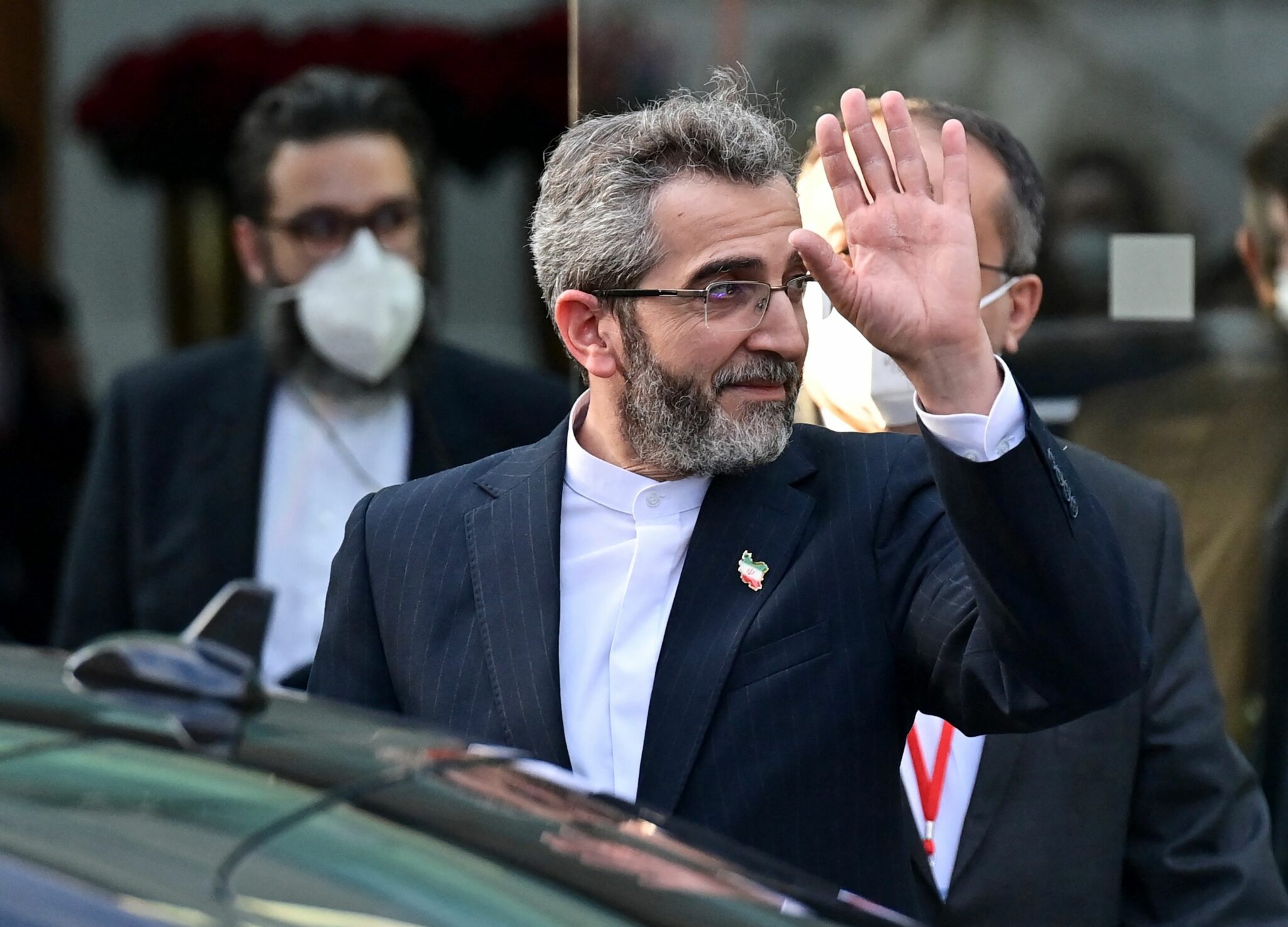 (FILES) In this file photo taken on December 3, 2021, Iran's chief nuclear negotiator Ali Bagheri Kani is seen leaving Vienna's Coburg Palais, venue of the Joint Comprehensive Plan of Action (JCPOA) meeting aimed at reviving the Iran nuclear deal. Iran's chief negotiator will fly back to Vienna on February 27th following consultations in Tehran, state media reported, as talks to revive the 2015 nuclear deal reached a critical stage. (Photo by JOE KLAMAR / AFP)