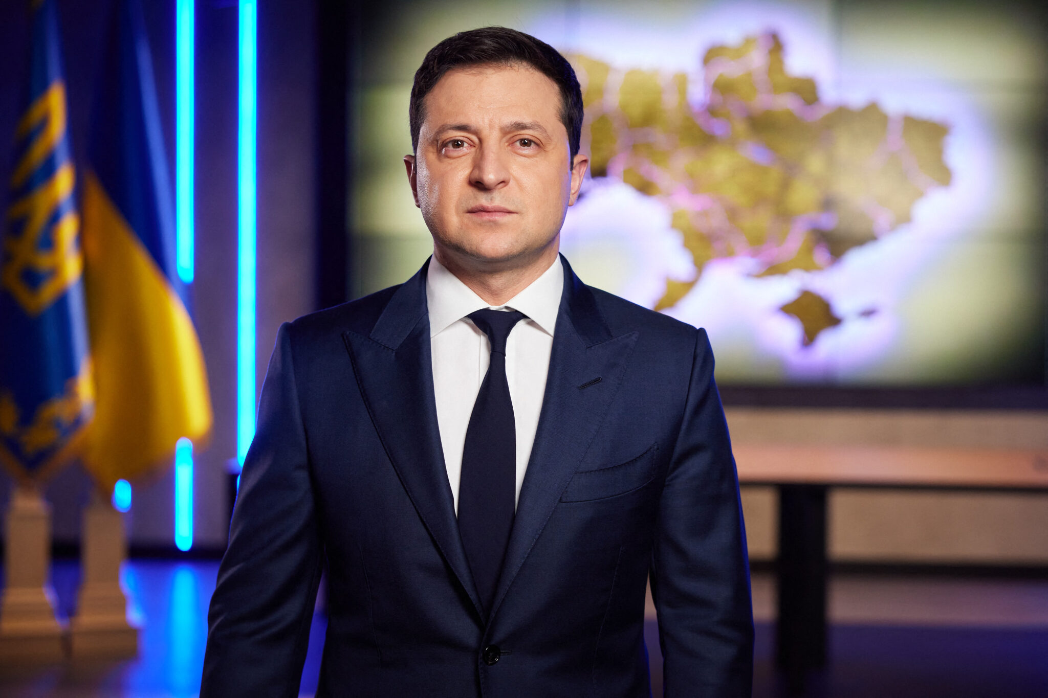 (FILES) In this file photo taken on February 21, 2022 Ukrainian President Volodymyr Zelensky addresses the nation following a meeting of the National Security and Defense Council after Russia recognised two eastern separatist regions and then ordered in troops to back up their independence claims, in Kyiv. The comedy satire in which Volodymyr Zelensky unexpectedly becomes Ukraine's president -- his now war-time job in real life -- will be aired again on Netflix, the streaming platform announced March 16, 2022. - RESTRICTED TO EDITORIAL USE - MANDATORY CREDIT "AFP PHOTO / Ukraine Presidency / handout" - NO MARKETING - NO ADVERTISING CAMPAIGNS - DISTRIBUTED AS A SERVICE TO CLIENTS (Photo by Handout / UKRAINE PRESIDENCY / AFP) / RESTRICTED TO EDITORIAL USE - MANDATORY CREDIT "AFP PHOTO / Ukraine Presidency / handout" - NO MARKETING - NO ADVERTISING CAMPAIGNS - DISTRIBUTED AS A SERVICE TO CLIENTS