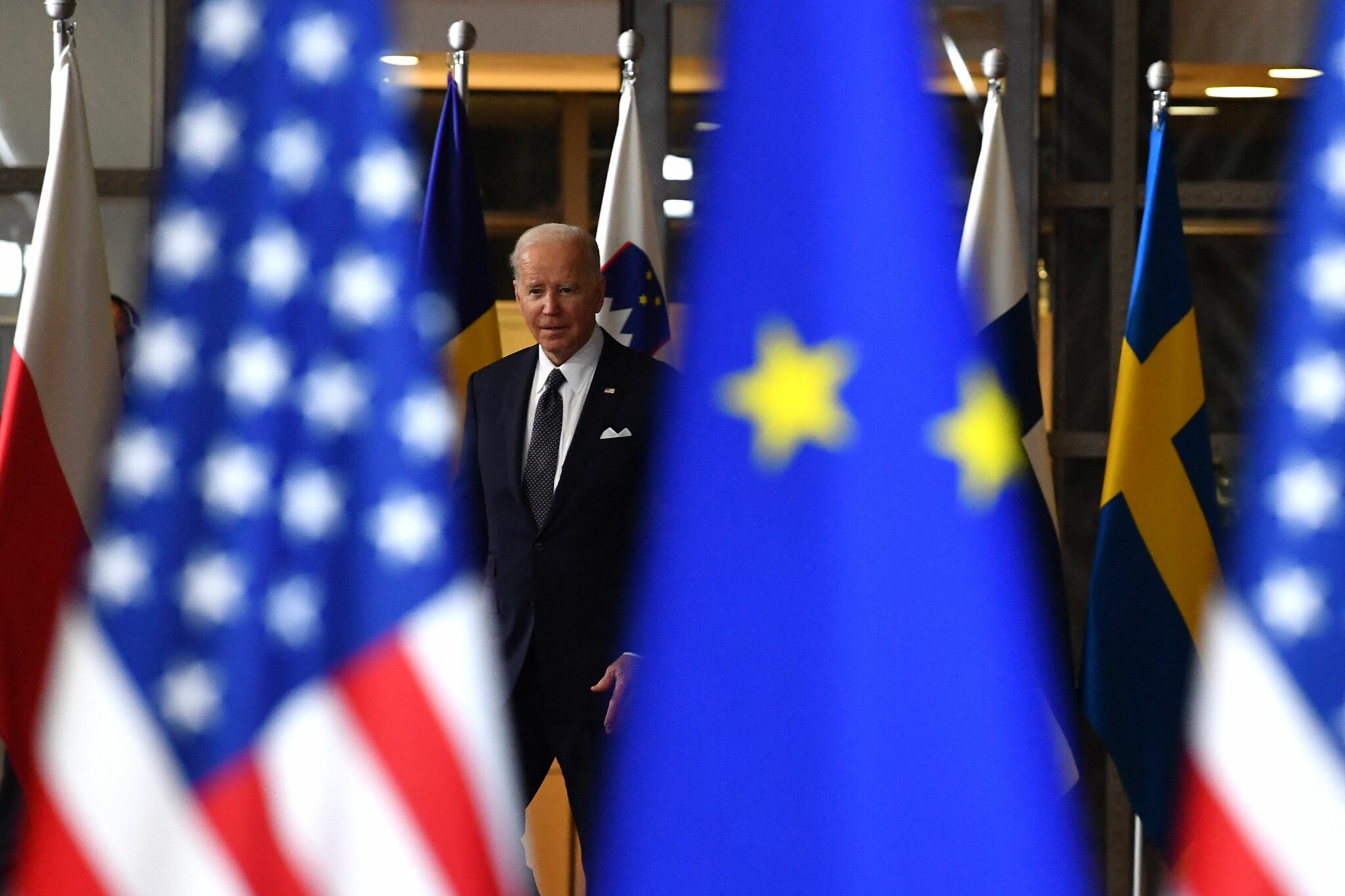 US President Joe Biden arrives for a European Union (EU) summit following Russia's invasion of the Ukraine one month ago, at EU Headquarters in Brussels on March 24, 2022. US President Joe Biden on March 24, 2022, backed excluding Russia from the G20 grouping of major economies over its invasion of Ukraine. (Photo by JOHN THYS / AFP)