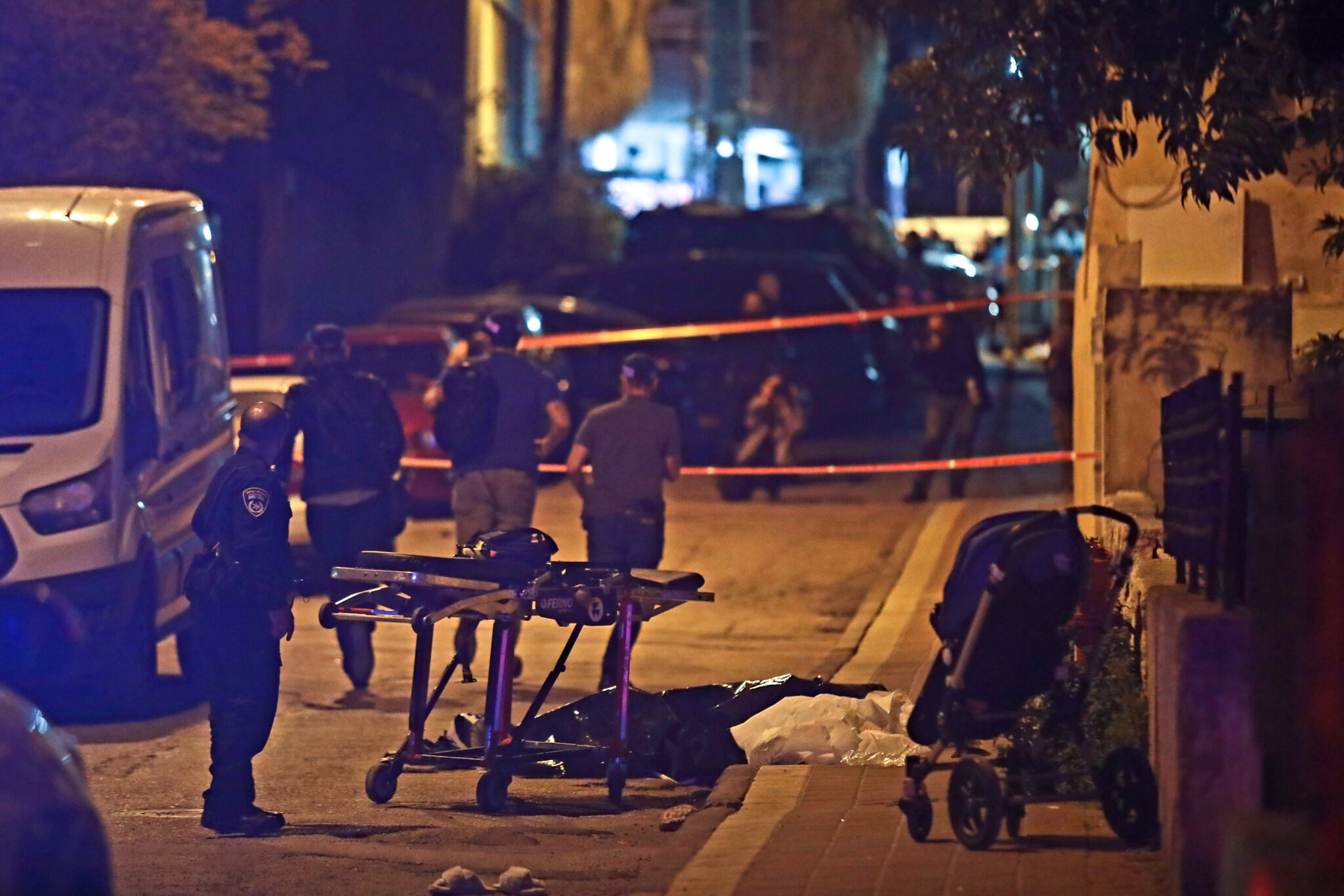 (220329) -- BNEI BRAK, March 29, 2022 (Xinhua) -- Photo taken on March 29, 2022 shows the scene of a shooting attack in Bnei Brak, a suburb of Tel Aviv, Israel. A Palestinian gunman opened fire at passersby and vehicles outside the Israeli city Tel Aviv late Tuesday, killing five people in the third shooting or knife attack in a week, prompting the police to raise its alert level nationwide to "the highest possible." (Gideon Markowicz/JINI via Xinhua)