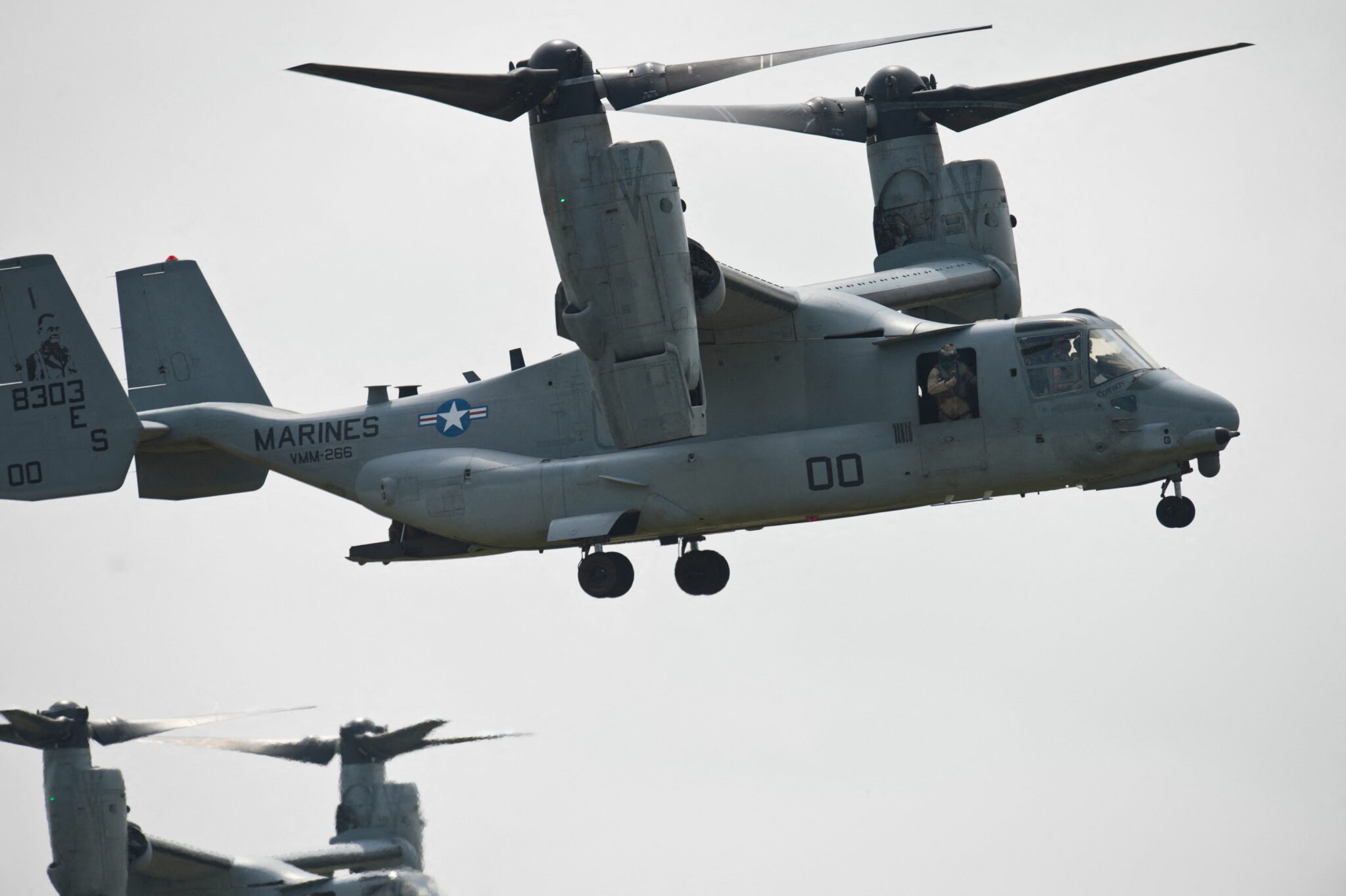 (FILES) In this file photo taken on May 26, 2015 A MV-22B Osprey aircraft is operated during the "Platinum Eagle 15" military exercise at training facilities in Babadag, Romania. A US Osprey aircraft "was reported missing at 18:26 (1726 GMT) south of Bodo" in northern Norway in bad weather, the regional emergency services (HRS) said in a statement on March 19, 2022. (Photo by Daniel MIHAILESCU / AFP)