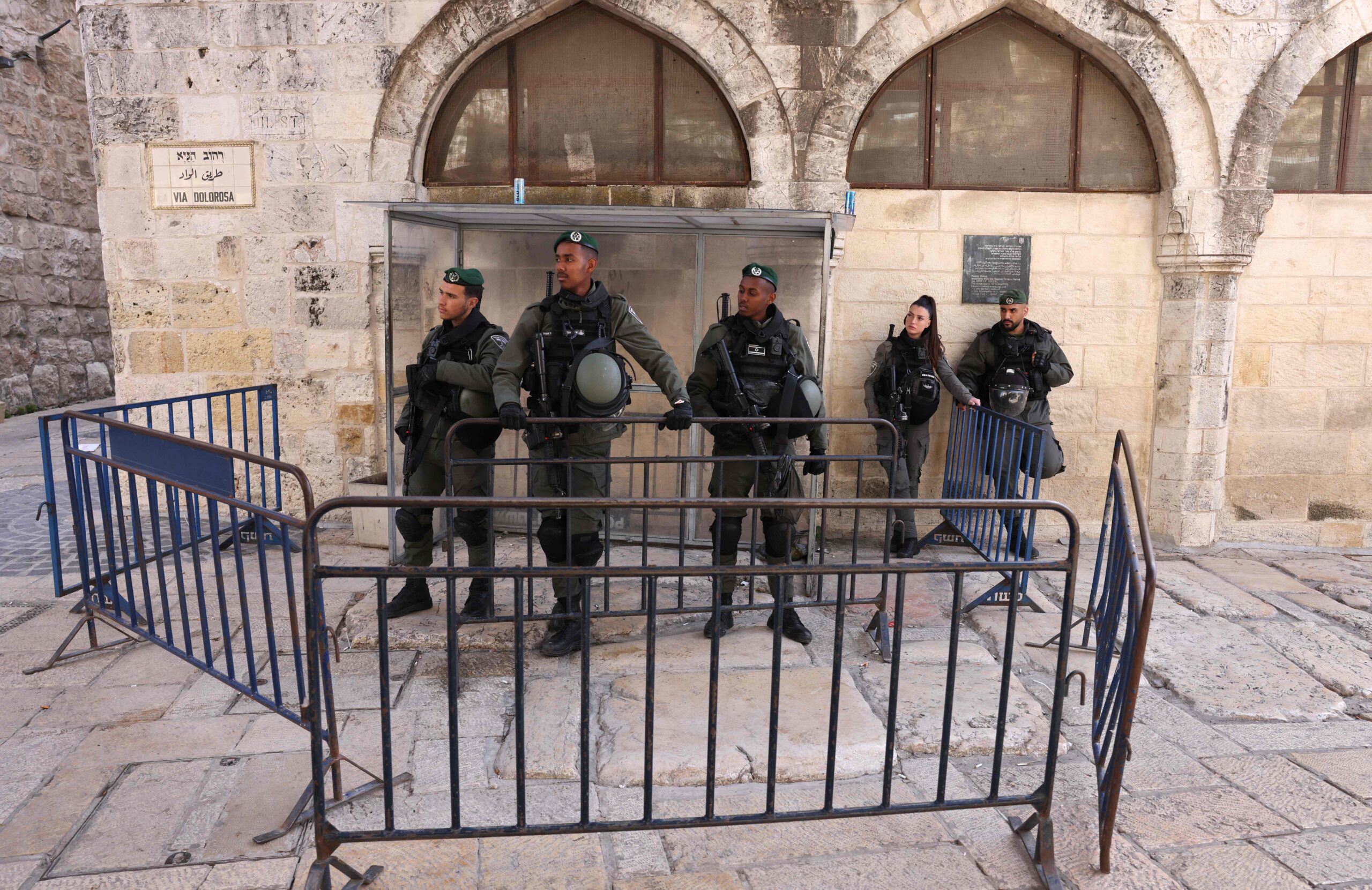 Israeli security forces stand guard in Jerusalem's Old City on March 31, 2022. (Photo by Menahem KAHANA / AFP)