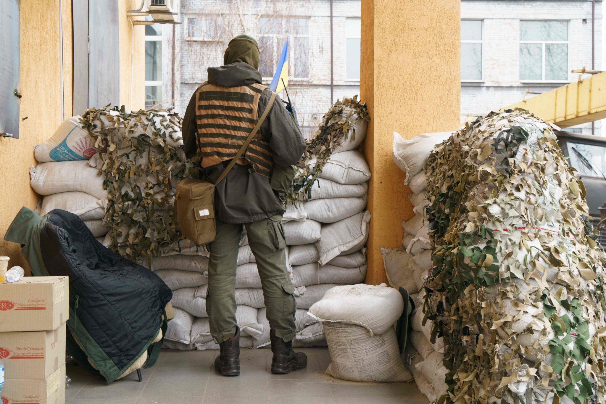 A soldier stands guard outside the military hospital in Zaporizhzhya, on March 31, 2022, amid Russian invasion of Ukraine. (Photo by emre caylak / AFP)