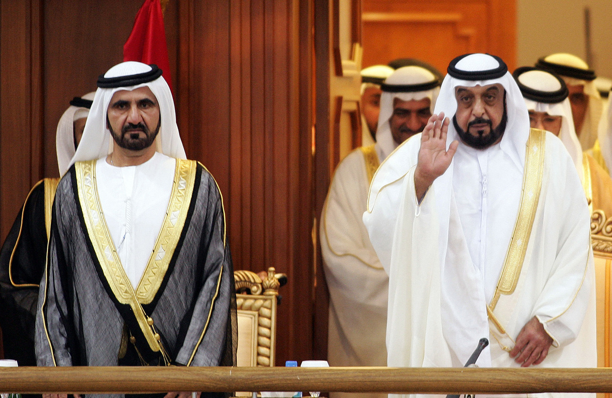 (FILES) In this file photo taken on February 12, 2007 UAE President Sheikh Khalifa Bin Zayed Al-Nahyan (R), and Crown Prince and Dubai ruler Sheikh Mohamed Bin Rashid Al-Maktoum arrive for the inauguration of the National Federal Council. The United Arab Emirates' President Sheikh Khalifa bin Zayed Al-Nahyan died aged 73 on May 13, 2022, state media said, after battling illness for several years. (Photo by Karim SAHIB / AFP)