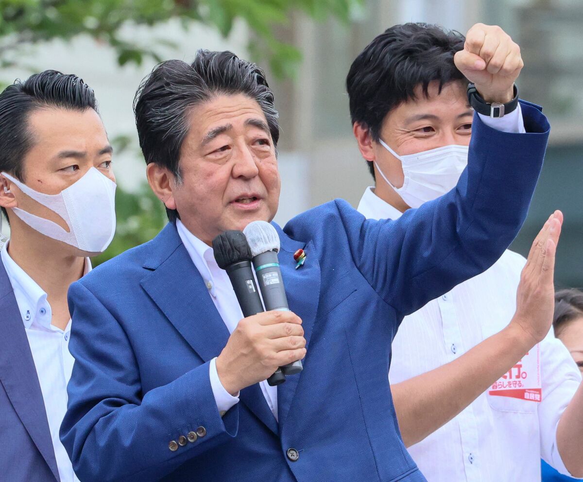 This picture taken on July 6, 2022 shows former Japanese Prime Minister Shinzo Abe delivering a campaign speech for the ruling Liberal Democratic Party (LDP) candidate Keiichiro Asao for the Upper House election in Yokohama, suburban Tokyo. Japan's former prime minister Shinzo Abe was shot at a campaign event on July 8, 2022, a government spokesman said, as local media reported the nation's longest-serving premier was showing no vital signs. (Photo by Yoshikazu Tsuno / AFP)