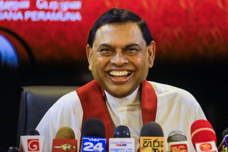 Former Sri Lanka's finance minister Basil Rajapaksa, the younger brother of Sri Lanka's President Gotabaya Rajapaksa, speaks during a press conference to announce his resignation as member of parliament, in Colombo on June 9, 2022. (Photo by AFP)