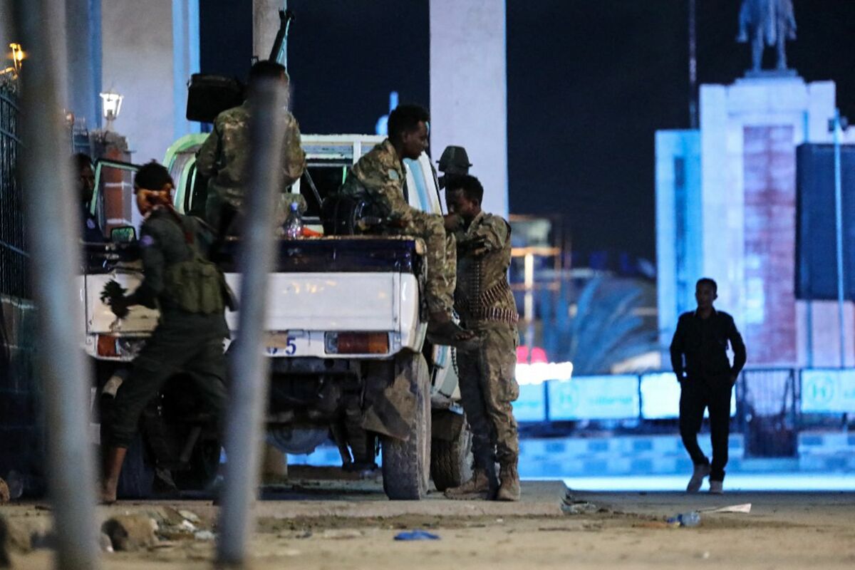 Security forces patrol near the Hayat Hotel after an attack by Al-Shabaab fighters in Mogadishu on August 20, 2022. Al-Shabaab fighters attacked a hotel in the Somali capital Mogadishu in a hail of gunfire and explosions on August 19, 2022, with casualties reported, security sources and witnesses said. The assault on the Hayat Hotel triggered a fierce gunfight between security forces and gunmen from the jihadist group who are still holed up inside the building, security official Abdukadir Hassan told AFP. (Photo by Hassan Ali ELMI / AFP)