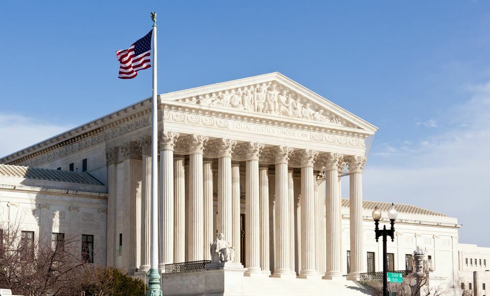 Facade of US Supreme court in Washington DC on sunny day