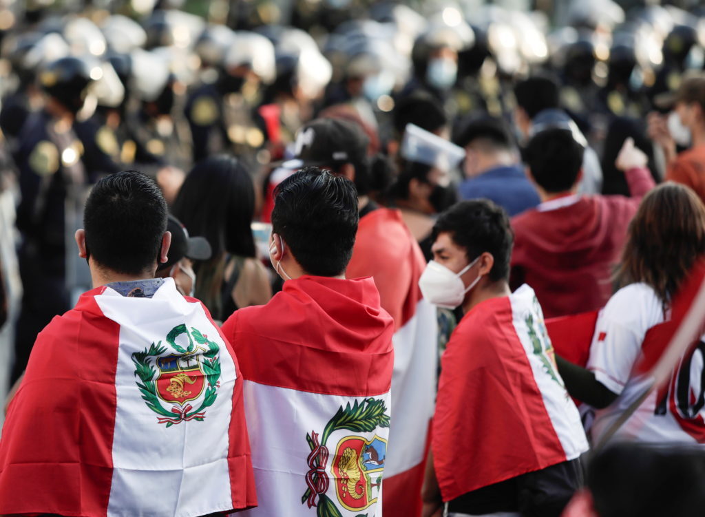 People gather outside Congress after Peru's interim President Manuel Merino announced his resignation, in Lima, Peru November 15, 2020. REUTERS/Angela Ponce NO RESALES. NO ARCHIVES