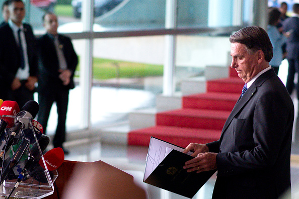 BRASILIA, BRAZIL - NOVEMBER 01: President of Brazil Jair Bolsonaro arrives for a press conference two days after being defeated by Lula da Silva in the presidential runoff at Alvorada Palace on November 1, 2022 in Brasilia, Brazil. Bolsonaro didn't acknowledge his defeat and asked supporters to protest in a pacific way and allowing free transit through the country. (Photo by Andressa Anholete/Getty Images)