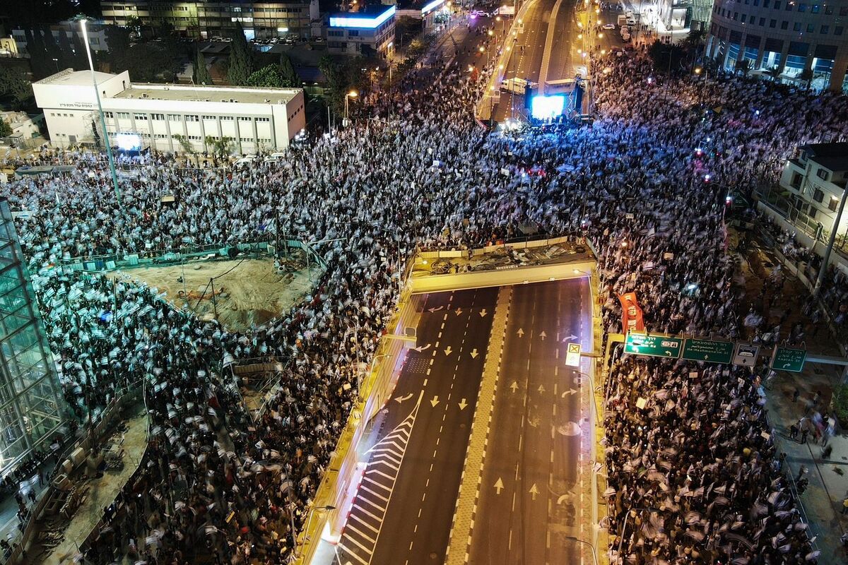 An aerial picture shows a protest against the Israeli government's controversial judicial reform bill in Tel Aviv on March 11, 2023. (Photo by JACK GUEZ / AFP)