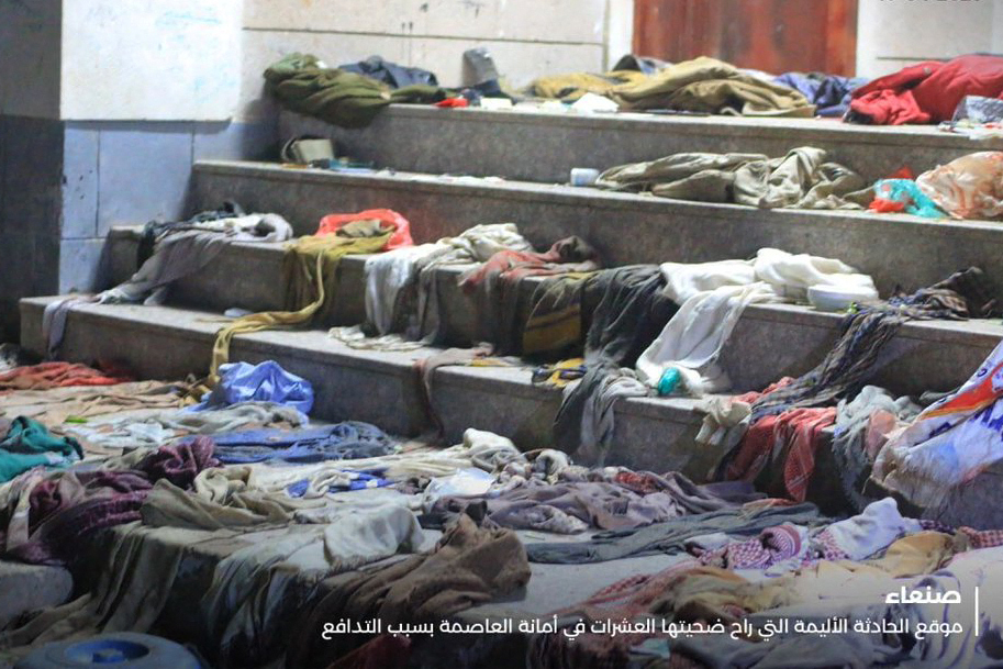 This handout image obtained from Yemen's Huthi Ansarullah Media Centre on April 20, 2023, shows clothes strewn at the scene of a stampede on the steps of a charity distribution centre in Sanaa overnight. At least 85 people were killed and over 300 injured in a crush at a charity distribution event in war-torn Yemen late on April 19, 2023, Huthi officials said, one of the deadliest stampedes in a decade. - === RESTRICTED TO EDITORIAL USE - MANDATORY CREDIT "AFP PHOTO / HO / Ansarullah Media Centre" - NO MARKETING - NO ADVERTISING CAMPAIGNS - DISTRIBUTED AS A SERVICE TO CLIENTS === (Photo by ANSARULLAH MEDIA CENTRE / AFP) / === RESTRICTED TO EDITORIAL USE - MANDATORY CREDIT "AFP PHOTO / HO / Ansarullah Media Centre" - NO MARKETING - NO ADVERTISING CAMPAIGNS - DISTRIBUTED AS A SERVICE TO CLIENTS ===