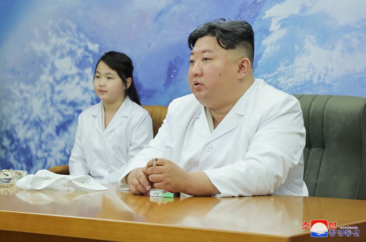 This picture taken on May 16, 2023 and released by North Korea's official Korean Central News Agency (KCNA) on May 17, 2023 shows North Korean leader Kim Jong Un (R) and his daughter, presumed to be named Ju Ae, meeting with the Non-permanent Satellite Launch Preparatory Committee before inspecting a military reconnaissance satellite, at an undisclosed location in North Korea. Kim Jong Un has inspected North Korea's first military spy satellite and gave the go-ahead for its "future action plan," state media said on May 17. - - South Korea OUT / ---EDITORS NOTE--- RESTRICTED TO EDITORIAL USE - MANDATORY CREDIT "AFP PHOTO/KCNA VIA KNS" - NO MARKETING NO ADVERTISING CAMPAIGNS - DISTRIBUTED AS A SERVICE TO CLIENTS
THIS PICTURE WAS MADE AVAILABLE BY A THIRD PARTY. AFP CAN NOT INDEPENDENTLY VERIFY THE AUTHENTICITY, LOCATION, DATE AND CONTENT OF THIS IMAGE. (Photo by KCNA VIA KNS / AFP) / ---EDITORS NOTE--- RESTRICTED TO EDITORIAL USE - MANDATORY CREDIT "AFP PHOTO/KCNA VIA KNS" - NO MARKETING NO ADVERTISING CAMPAIGNS - DISTRIBUTED AS A SERVICE TO CLIENTS
THIS PICTURE WAS MADE AVAILABLE BY A THIRD PARTY. AFP CAN NOT INDEPENDENTLY VERIFY THE AUTHENTICITY, LOCATION, DATE AND CONTENT OF THIS IMAGE.