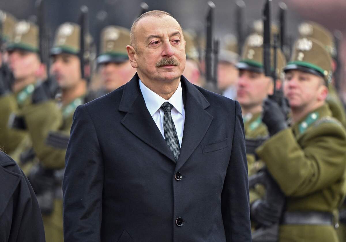 (FILES) The President of the Republic of Azerbaijan Ilham Aliyev reviews the honour guard with the Hungarian President (unseen) during a welcoming ceremony for him in front of the parliament building at Kossuth square in Budapest on January 30, 2023. Azerbaijan's President Ilham Aliev said on September 20, 2023 that separatist forces are withdrawing from Karabakh, following Azerbaijan's military operation in the separatist region of Nagorno-Karabakh. (Photo by ATTILA KISBENEDEK / AFP)