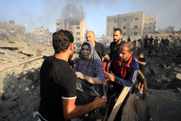 (231025) -- GAZA, Oct. 25, 2023 (Xinhua) -- Palestinians are seen after Israeli airstrikes in Gaza City, on Oct. 25, 2023. The death toll of Palestinians from Israeli airstrikes on the Gaza Strip has risen to 6,546, said the Hamas-run Health Ministry in Gaza Strip on Wednesday. Meanwhile, 17,439 Palestinians were wounded in the coastal enclave, the ministry said in a statement. (Photo by Yasser Qudih/Xinhua)