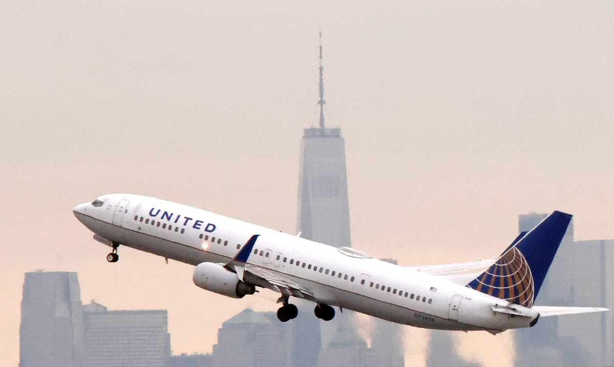 A United Airlines plane departs the Newark International Airport, in Newark, New Jersey, on January 11 2023. The US Federal Aviation Authority said Wednesday that normal flight operations "are resuming gradually" across the country following an overnight systems outage that grounded departures. (Photo by Kena Betancur / AFP)