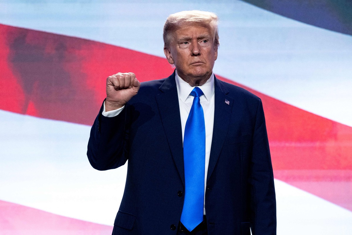 (FILES) Former US President and Republican presidential hopeful Donald Trump gestures after speaking during the Pray Vote Stand summit at the Omni Shoreham hotel in Washington, DC on September 15, 2023. Former US president Donald Trump said he plans to appear in a New York court on October 2 for the opening of a trial in which he is accused of a years-long scheme to inflate the value of real estate and financial assets. (Photo by ANDREW CABALLERO-REYNOLDS / AFP)