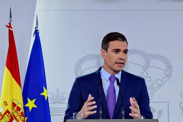 Spanish Prime Minister Pedro Sanchez gestures during a press conference at Moncloa Palace in Madrid, on June 25, 2022. The Spanish government announced on June 25, 2022 a new direct aid plan worth nine billion euros to mitigate the economic consequences of the conflict in Ukraine on the Spanish population. Presenting these measures at a press conference in Madrid, Prime Minister Pedro Sanchez said that if we add these new measures to those of six billion euros already taken in March, these direct aids would represent until the end of the year a total of 15 billion euros, or "more than one point of GDP of our country. (Photo by JAVIER SORIANO / AFP)