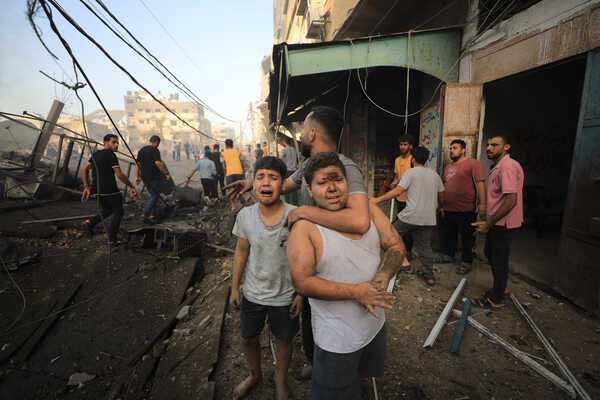 (231025) -- GAZA, Oct. 25, 2023 (Xinhua) -- Palestinians are seen on a street after Israeli airstrikes in Gaza City, on Oct. 25, 2023. The death toll of Palestinians from Israeli airstrikes on the Gaza Strip has risen to 6,546, said the Hamas-run Health Ministry in Gaza Strip on Wednesday. Meanwhile, 17,439 Palestinians were wounded in the coastal enclave, the ministry said in a statement. (Photo by Yasser Qudih/Xinhua)