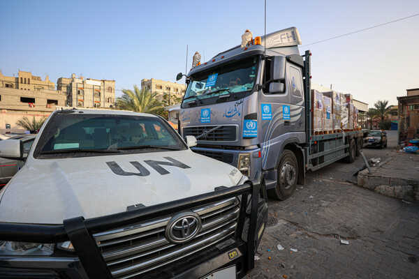 (231023) -- GAZA, Oct. 23, 2023 (Xinhua) -- A truck loaded with humanitarian supplies that entered Gaza from the Rafah crossing is seen in Khan Younis, southern Gaza Strip, on Oct. 23, 2023. Twenty trucks carrying humanitarian supplies entered Gaza from Egypt on Monday, far from being enough, said UN humanitarians on Monday. (Photo by Rizek Abdeljawad/Xinhua)