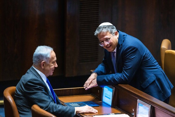 Likud leader MK Benjamin Netanyahu with Head of the Otzma Yehudit party MK Itamar Ben Gvir at a vote in the assembly hall of the Knesset, the Israeli parliament in Jerusalem, on December 28, 2022. Photo by Olivier Fitoussi/Flash90 *** Local Caption *** כנסת
מליאה
הצבעה
חברי
כנסת
חוק
פקודת
המשטרה
איתמר בן גביר
עוצמה יהודית
בנימין נתניהו
יו"ר
הליכוד