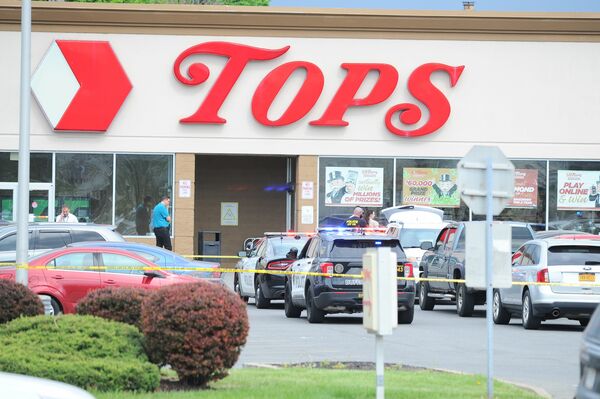 BUFFALO, NY - MAY 14: Buffalo Police on scene at a Tops Friendly Market on May 14, 2022 in Buffalo, New York. According to reports, at least 10 people were killed after a mass shooting at the store with the shooter in police custody. John Normile/Getty Images/AFP
== FOR NEWSPAPERS, INTERNET, TELCOS & TELEVISION USE ONLY ==