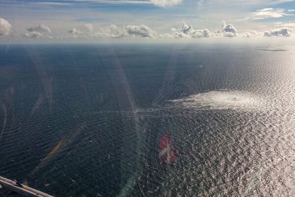 (220928) -- COPENHAGEN, Sept. 28, 2022 (Xinhua) -- Aerial photo released by the Danish Ministry of Defense on Sept. 27, 2022 shows the Nord Stream gas pipeline leak site. Measuring stations in Sweden registered strong underwater explosions in the same area of sea as the gas leaks that occurred in the Nord Stream 1 and 2 pipelines on Monday, Swedish television (SVT) reported on Tuesday. The government of Denmark considers the Nord Stream gas pipeline leaks "deliberate actions," Danish Prime Minister Mette Frederiksen said on Tuesday. (Danish Defense Ministry/Handout via Xinhua)