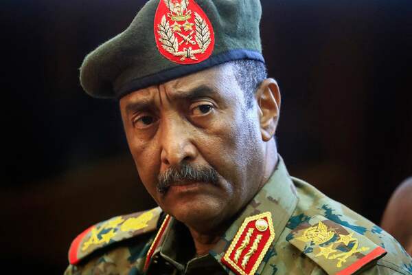 (FILES) In this file photo taken on October 26, 2021 Sudan's top army general Abdel Fattah al-Burhan speaks during a press conference at the General Command of the Armed Forces in Khartoum. Sudan's coup leader Abdel Fattah al-Burhan said on July 4, 2022 that the army would make way for a civilian government, a demand made for months by street protesters and repeatedly called for by the international community. Burhan said the military would no longer participate in national talks facilitated by the UN and regional blocs, wanting instead "to make room for political and revolutionary forces and other national factions" to form a civilian government. (Photo by Ashraf SHAZLY / AFP)